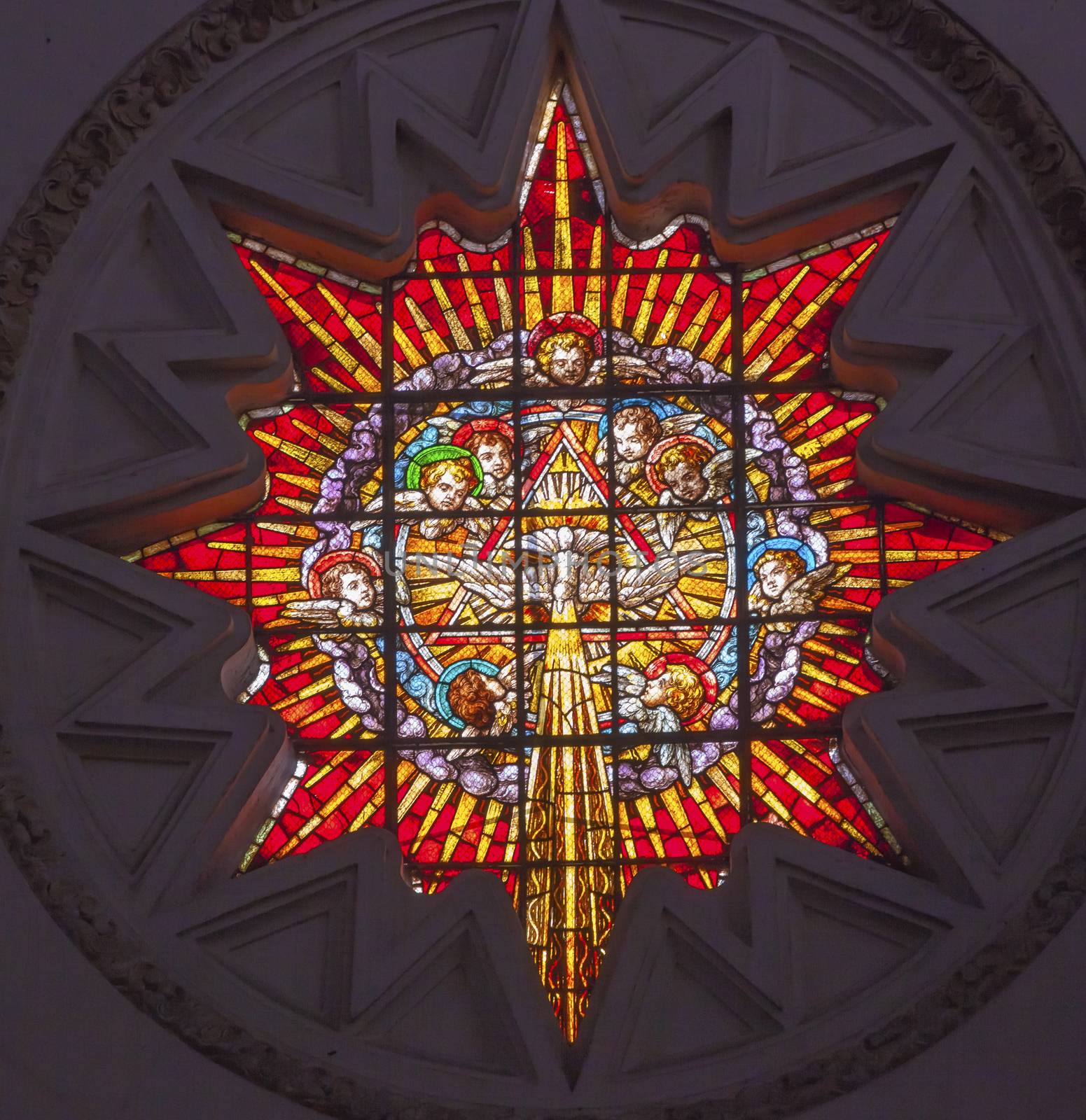 Stained Glass Angels Holy Spirit Basilica Cathedral Andalusia Granada Spain.  Built in the 1500s, housing the tombs of King Ferdinand and Isabella.  Dome by Diego de Siloe, 