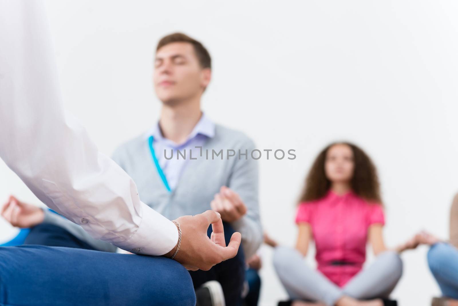 close-up of a human hand, meditates in the workplace