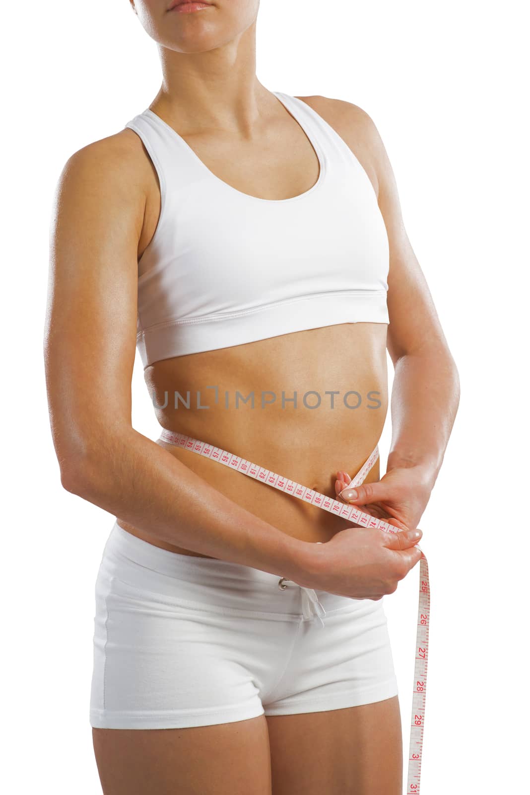 young athletic woman measuring waist by adam121