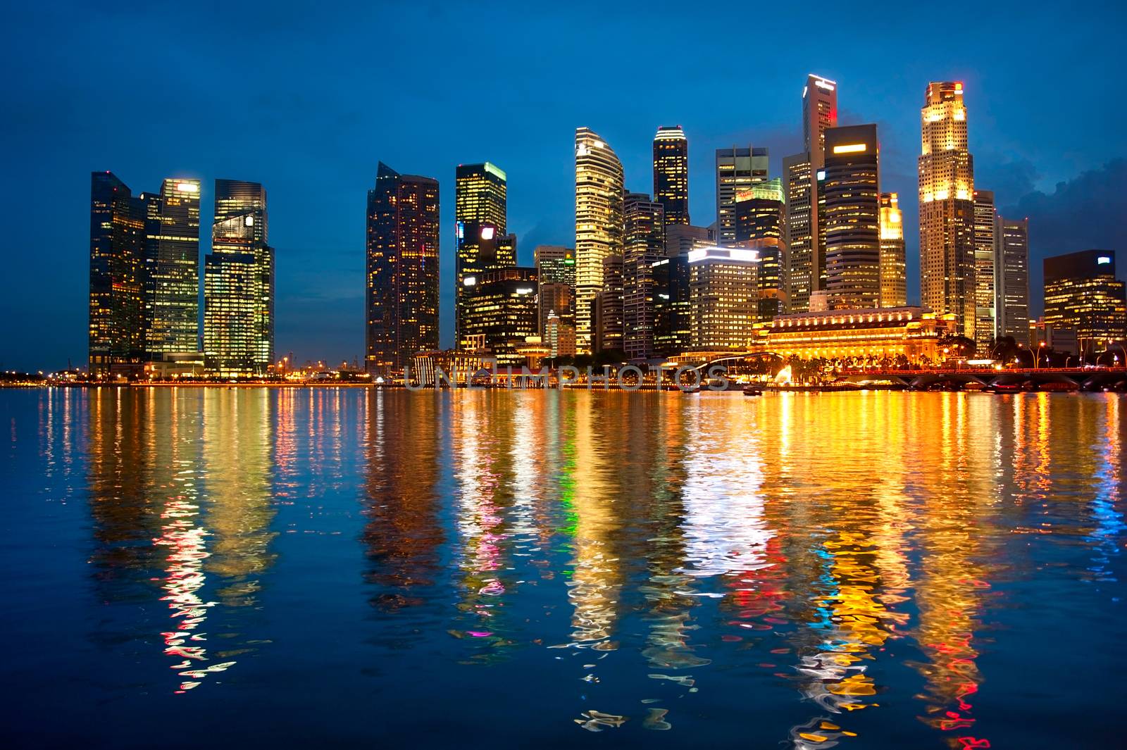 Panorama of Singapore downtown with reflection in a river