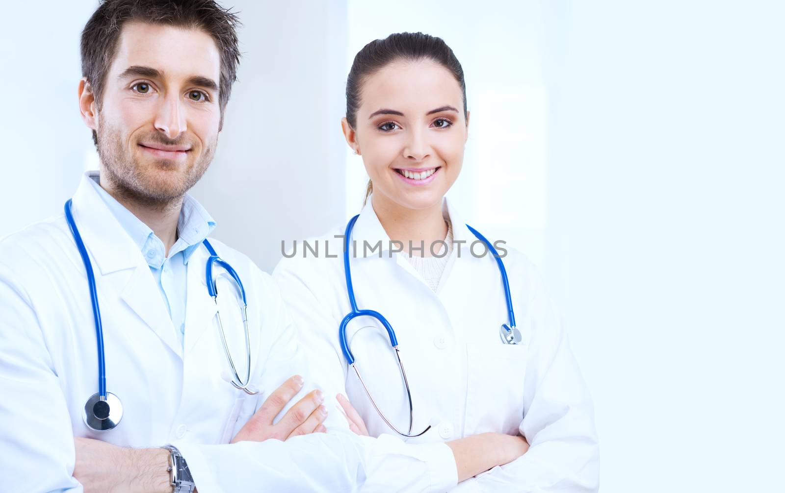 Professional doctor at hospital with crossed arms