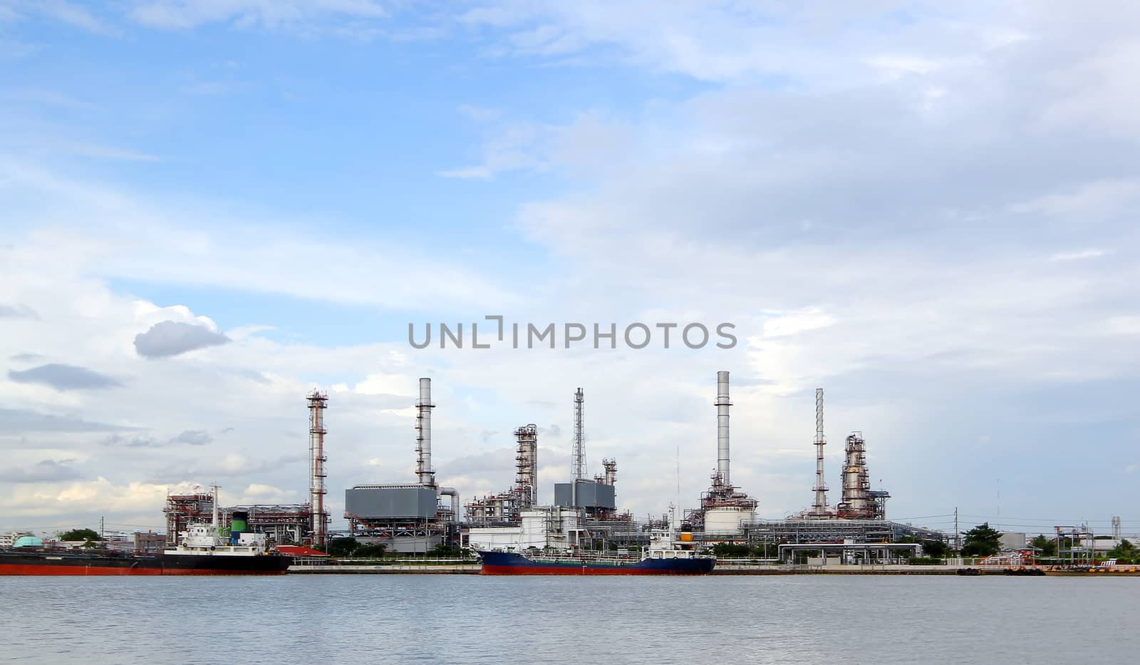 Oil refinery with beautiful sky