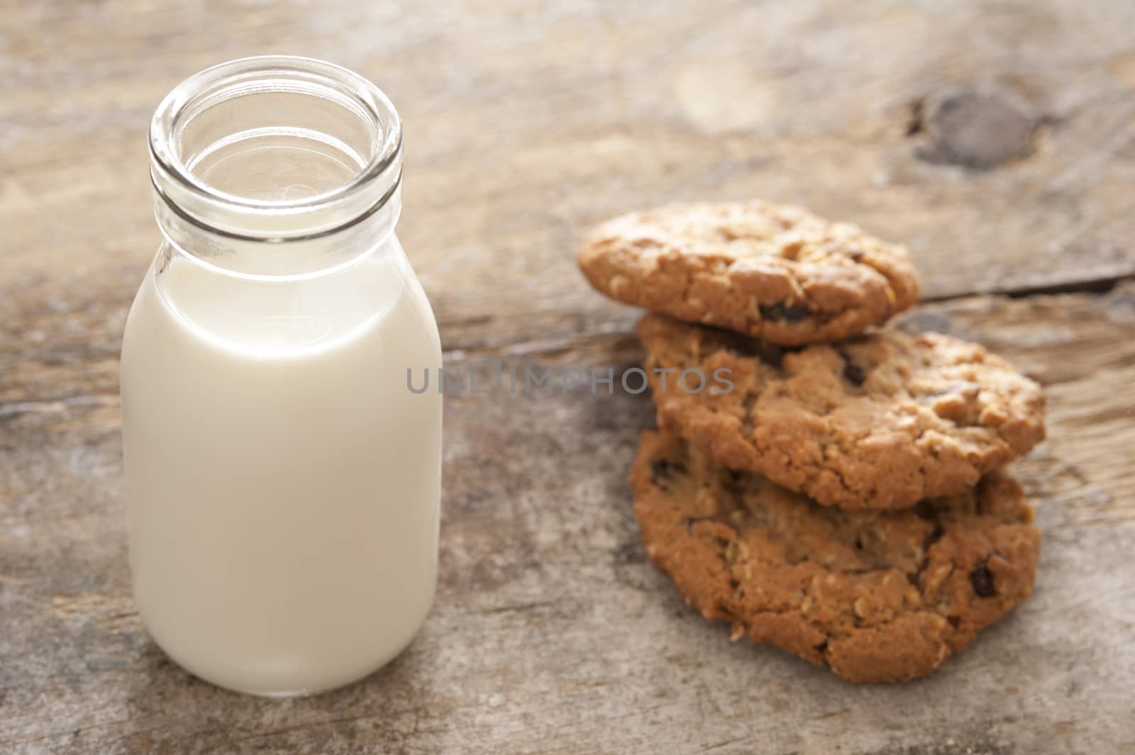 Fresh milk and cookies by stockarch