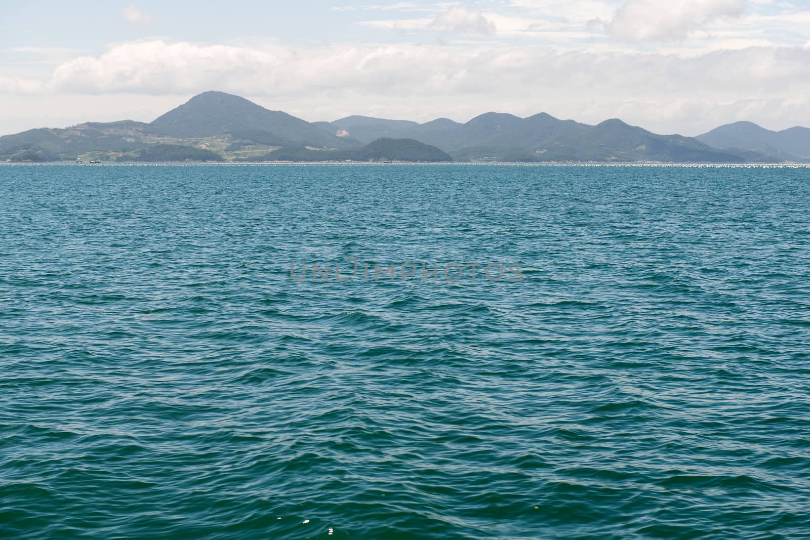 Coast line of South Korea close to Yeosu as seen from a ship