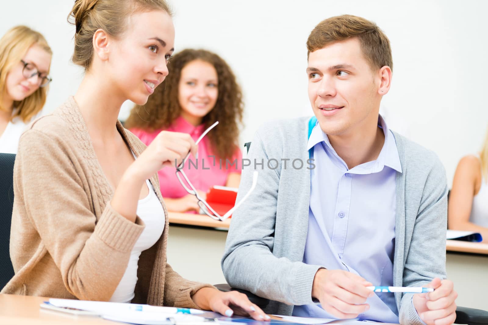 image of a two students in the class talk