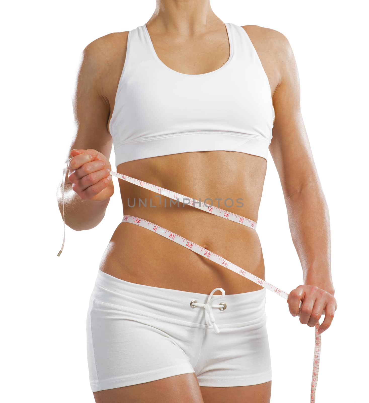 young athletic woman measuring waist measuring tape, isolated on white background