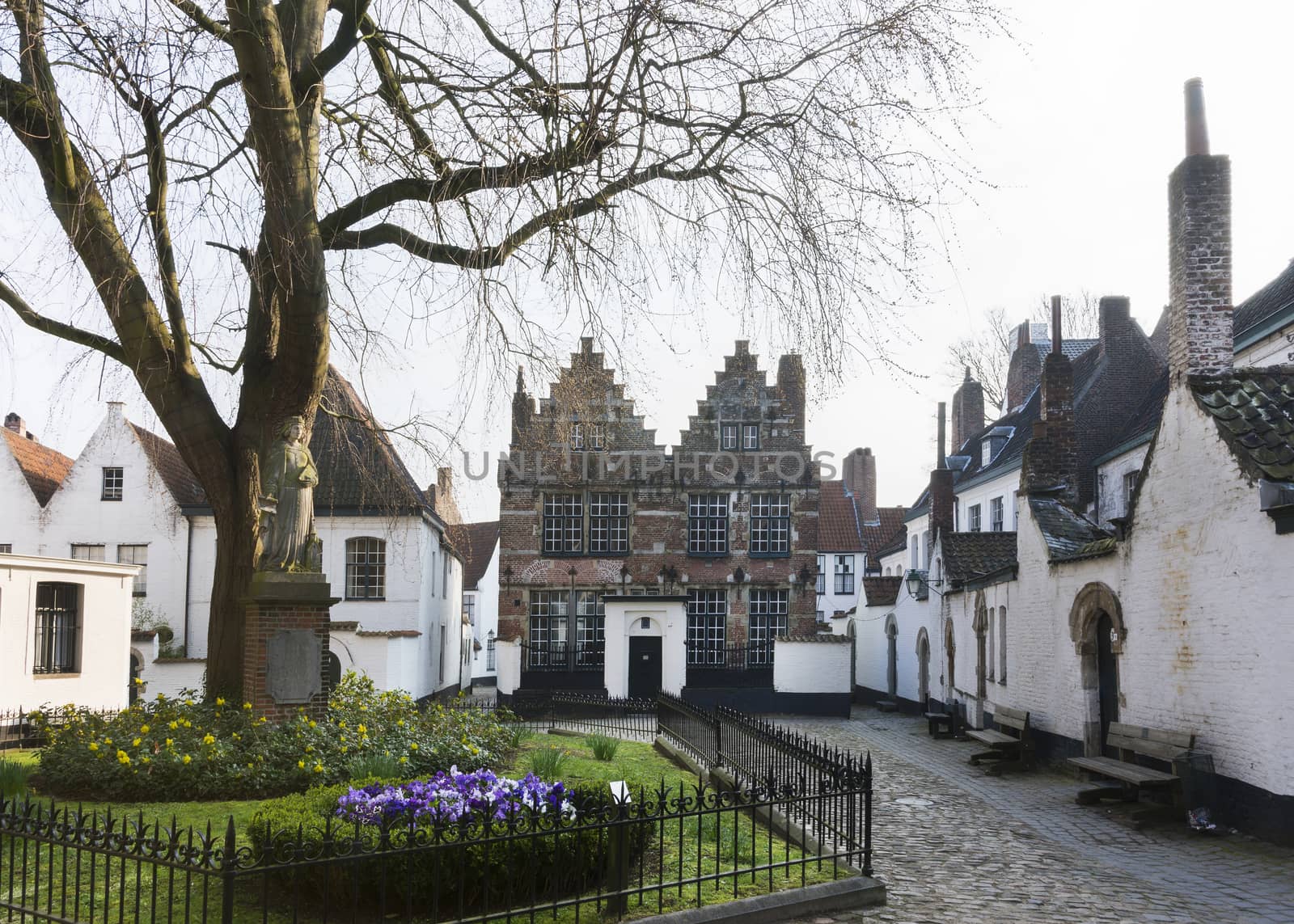 Courtyard of Kortrijk Beguinage, Belgium. by Claudine