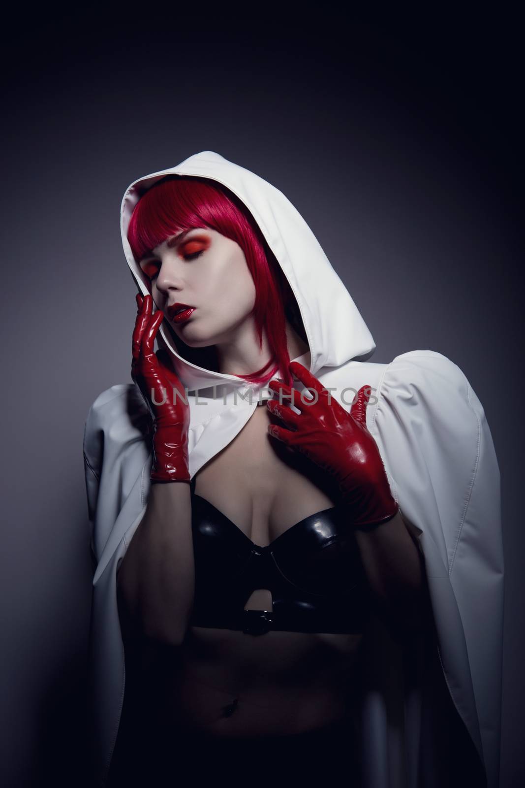 Sensual fetish woman wearing white hooded jacket, artistic noire style shot 