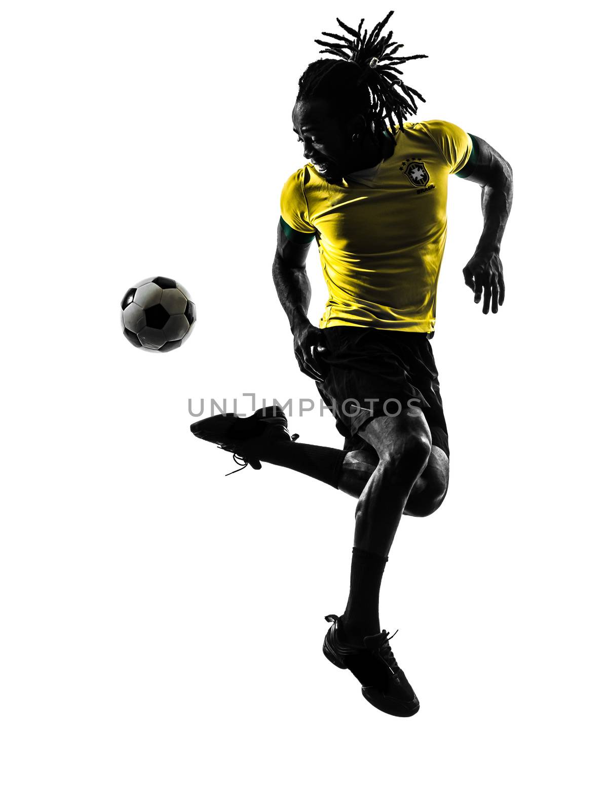 one black Brazilian soccer football player man in silhouette studio on white background