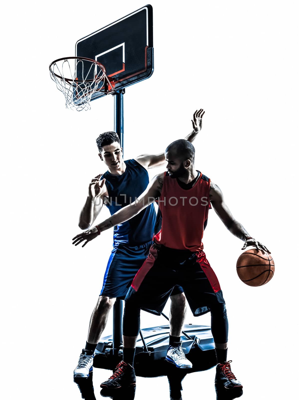 two men basketball players competition dribbling in silhouette isolated white background