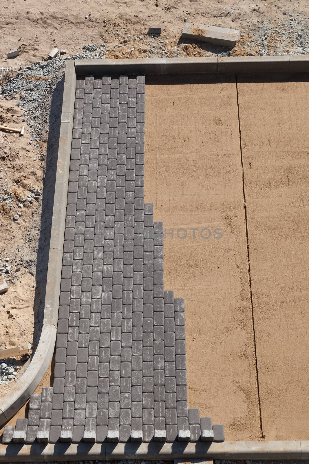 making pavement in construction site from above