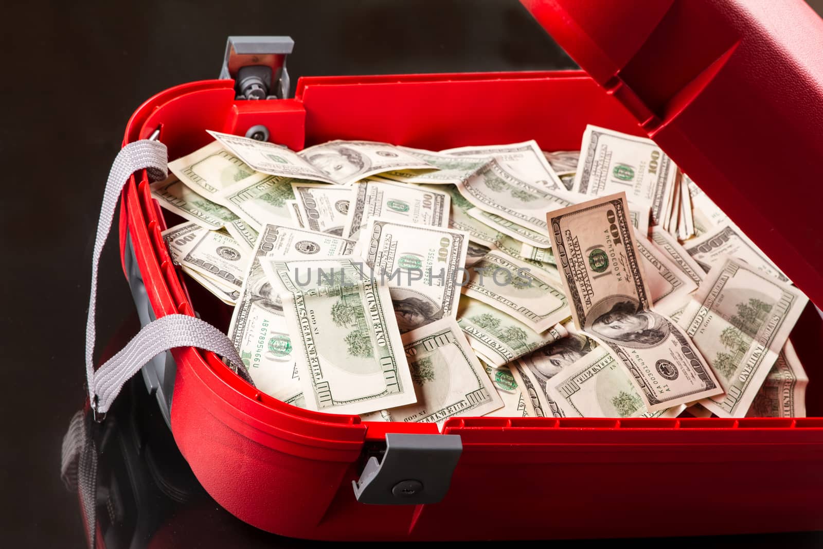 A Suitcase with lots of dollars

