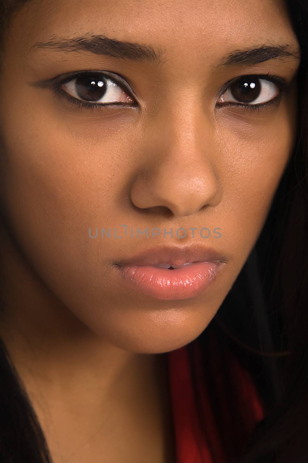 young beautiful woman closeup portrait, studio shot