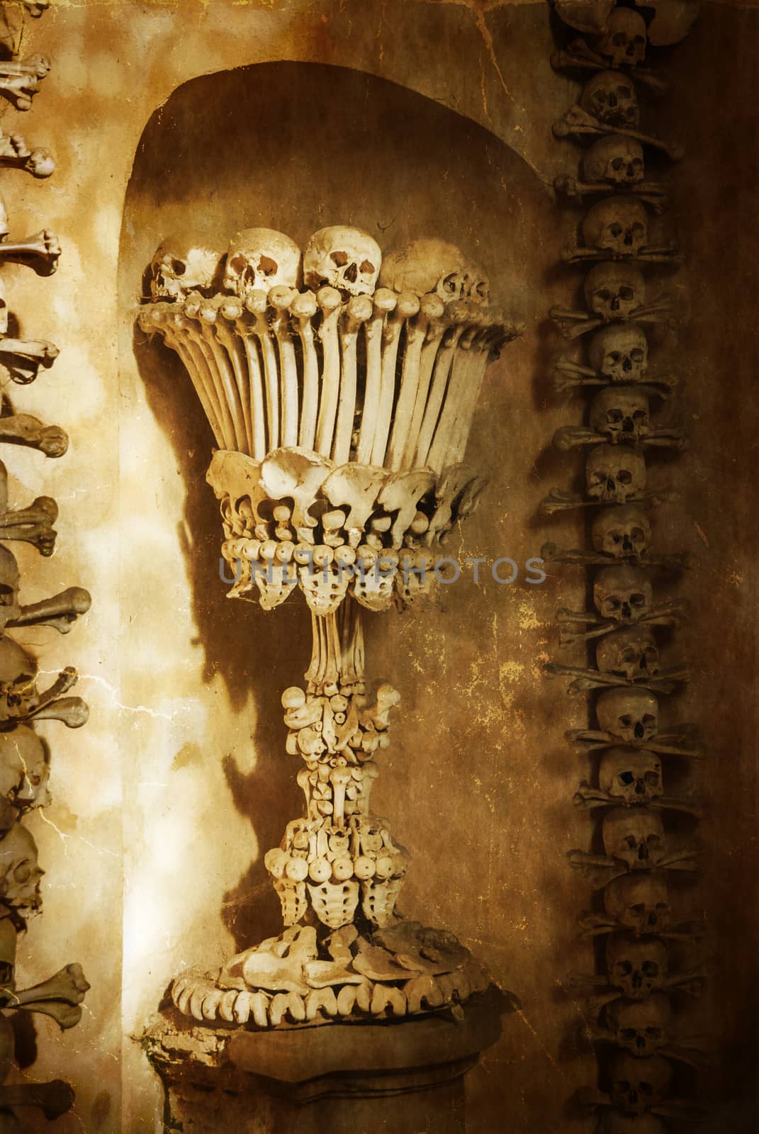 Skulls and bones. Kutna Hora, Czech Republic. textured old paper by Zhukow