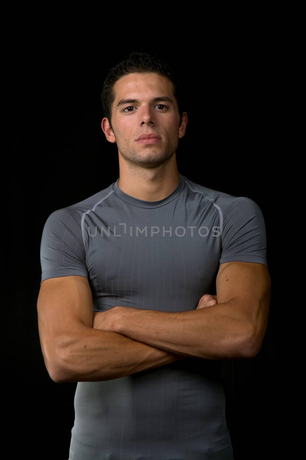 young man portrait, on a black background