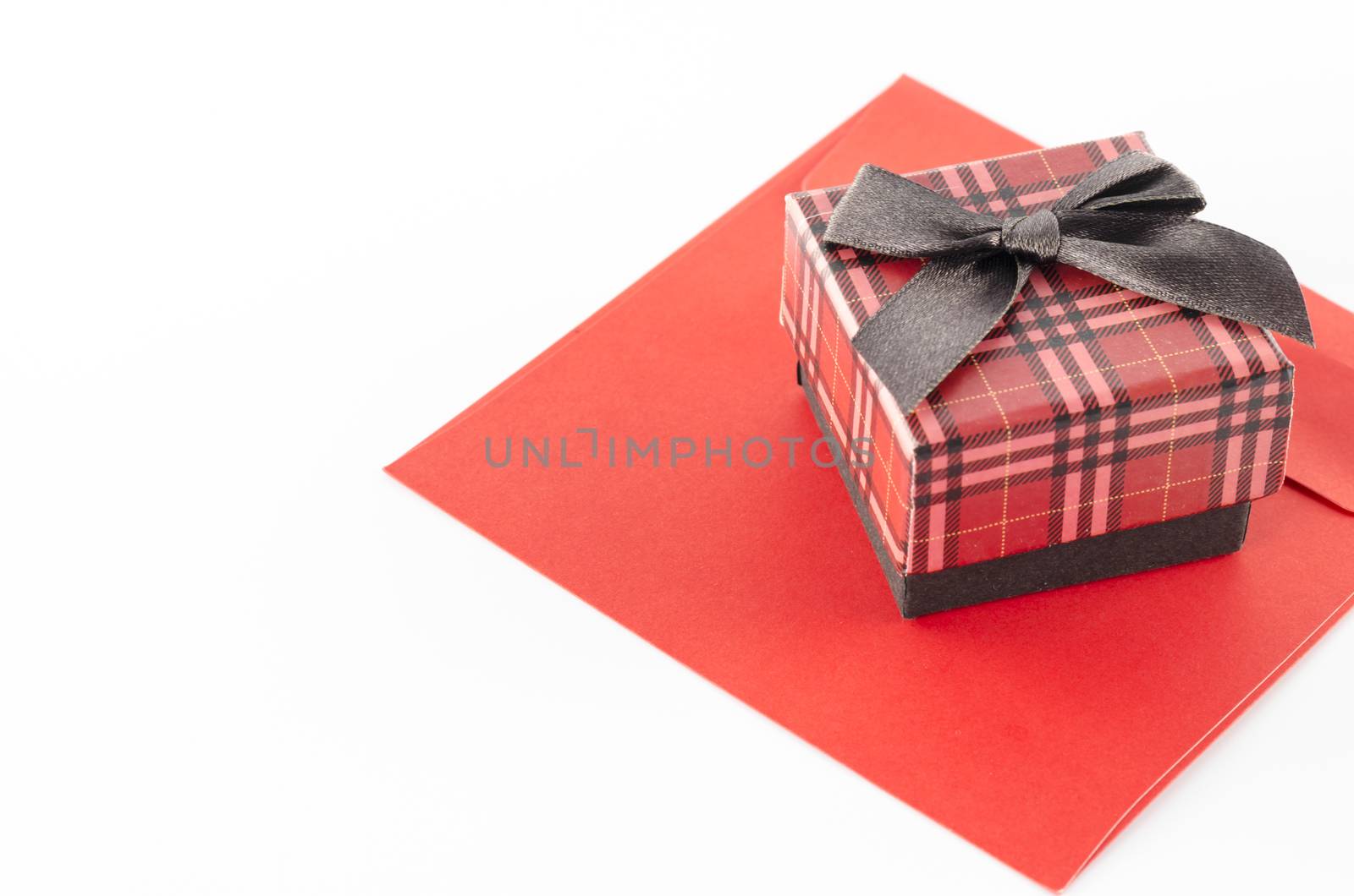 red enveloper and scotch gift box isolated on white background