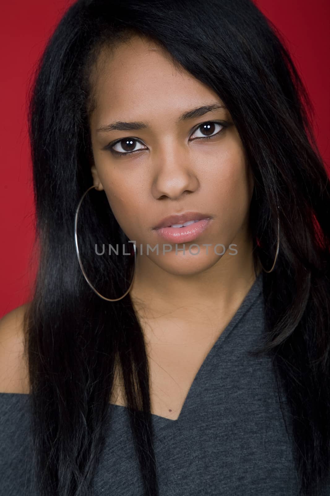 young casual woman close up portrait, studio shot