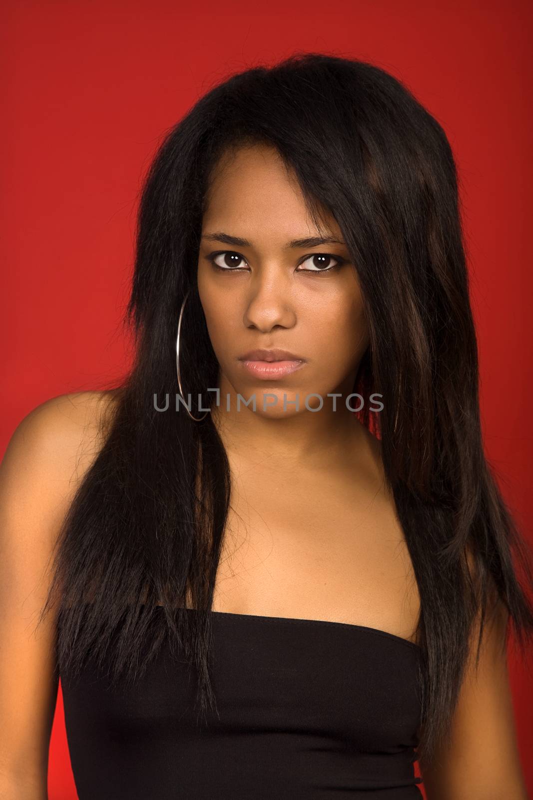 young casual woman close up portrait, studio shot