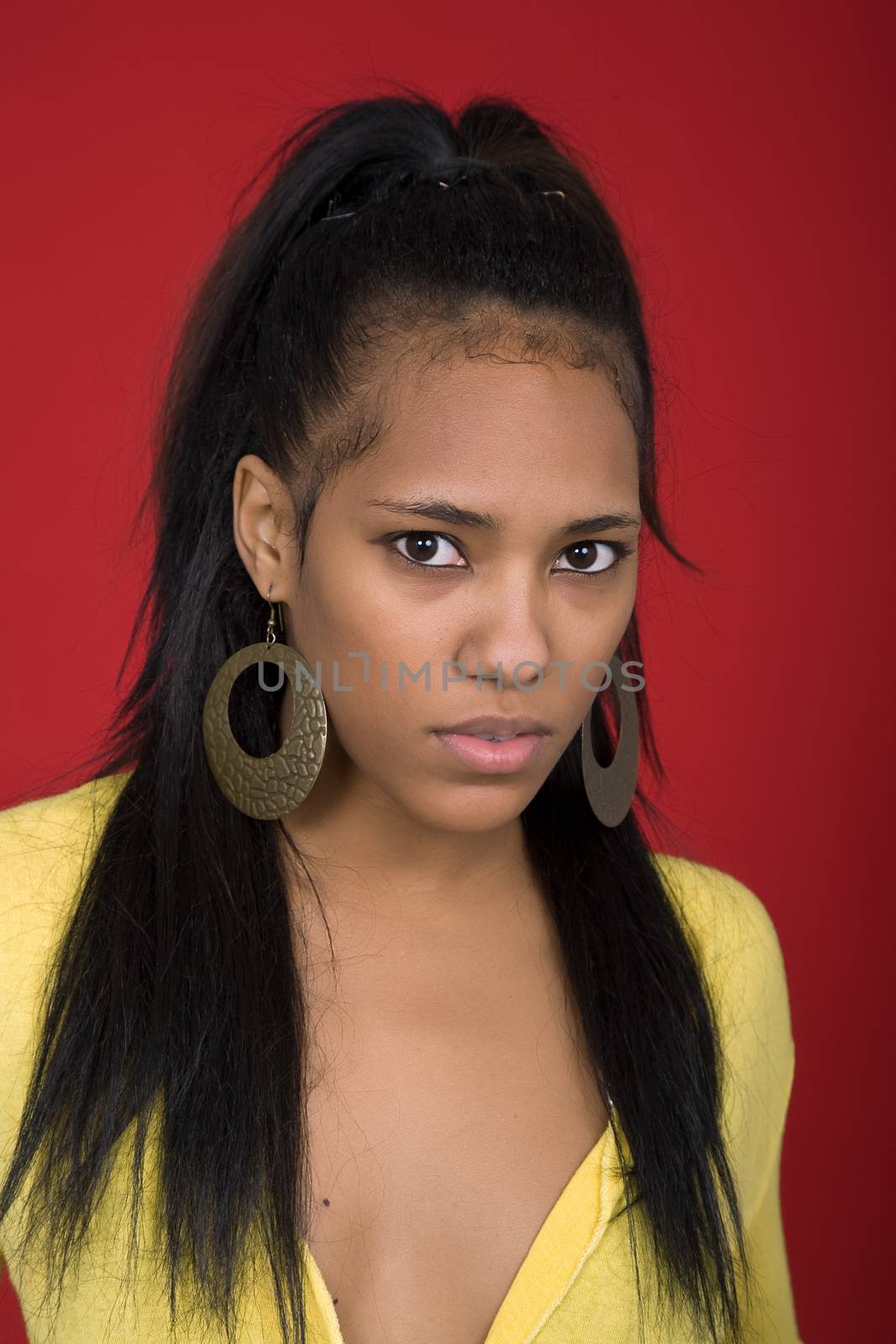 young casual woman close up portrait, studio shot