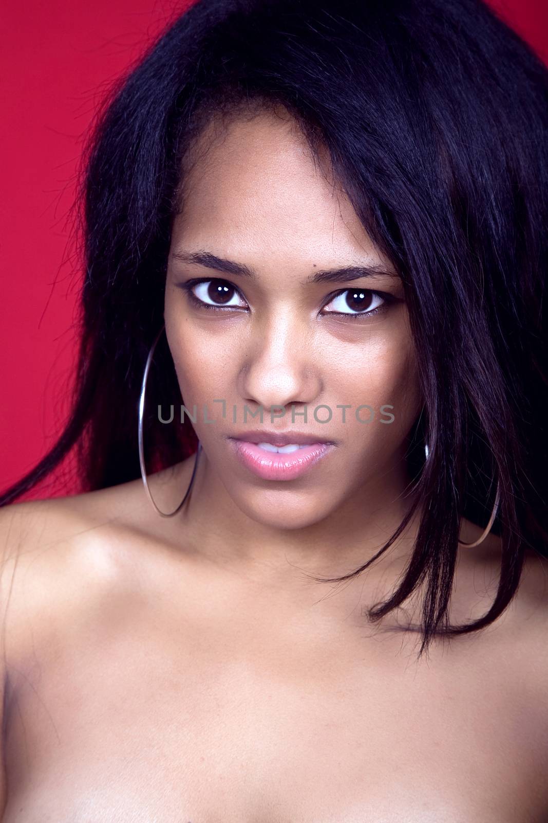 young casual woman close up portrait, studio shot