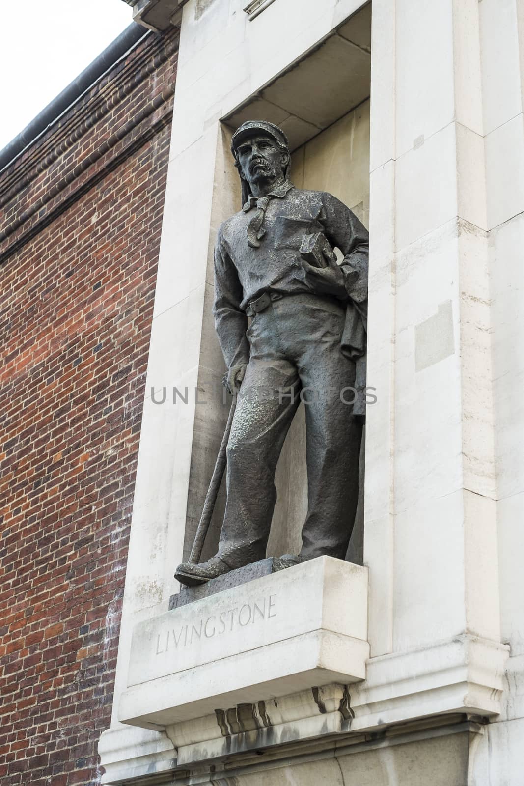LONDON, UK - NOVEMBER 13: Statue of African explorer David Livingstone outside the Royal Geographical Building. November 13, 2013 in London.