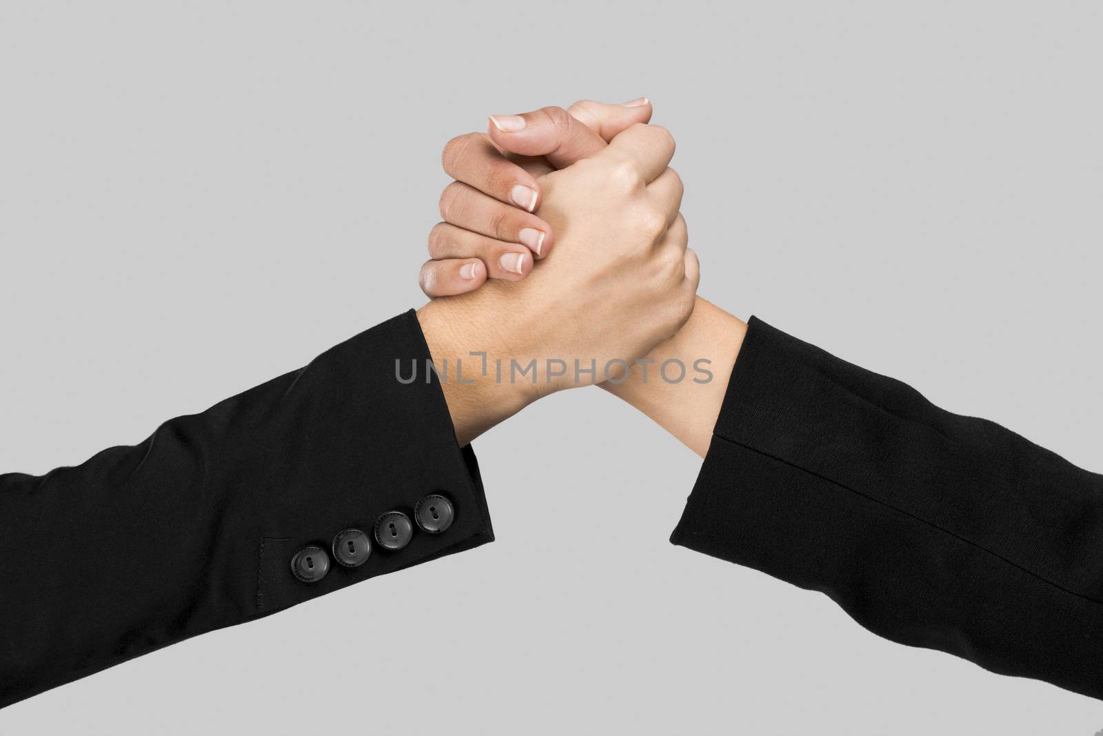 Greeting hands over a gray background