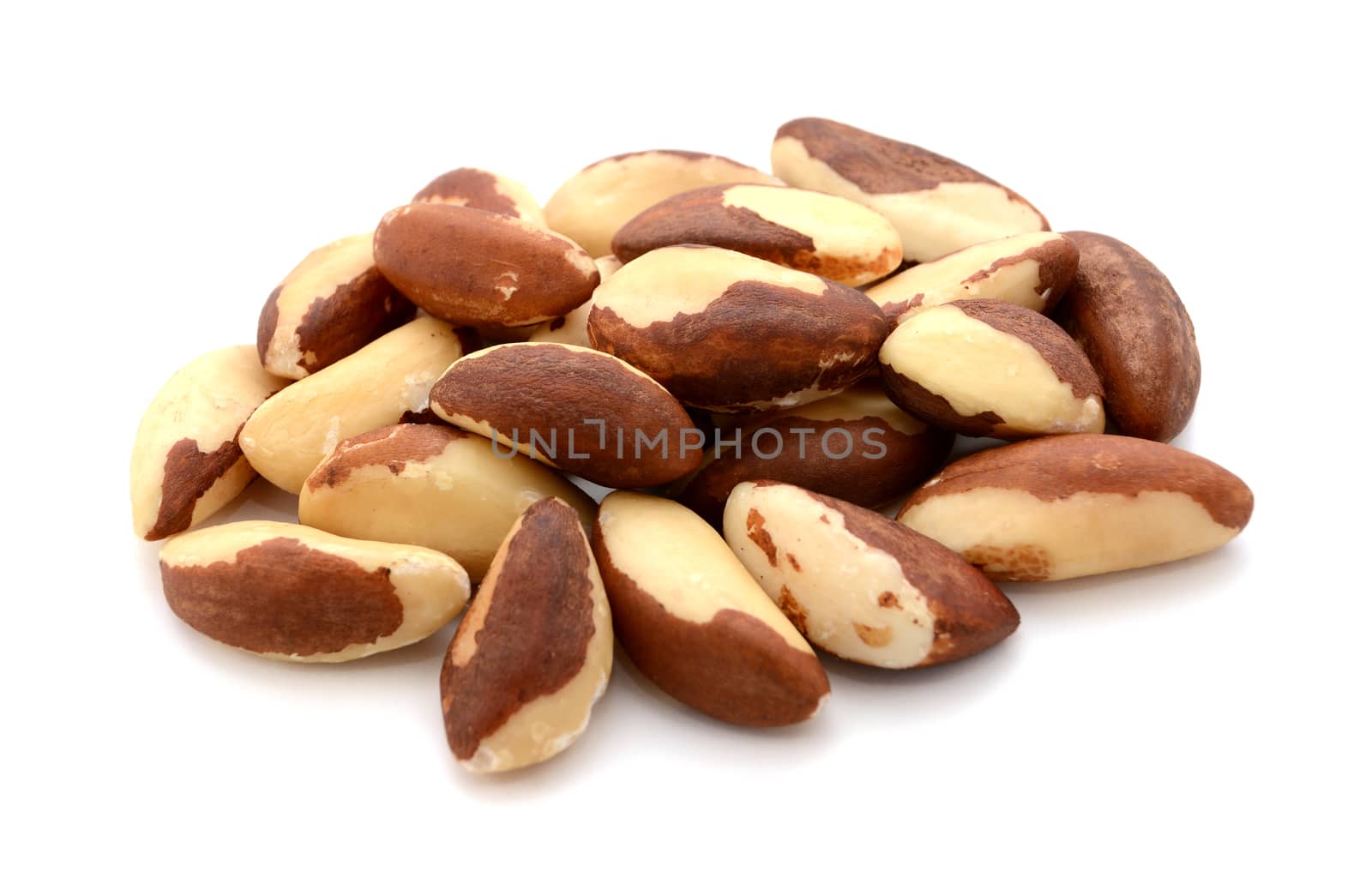 Whole brazil nuts, isolated on a white background