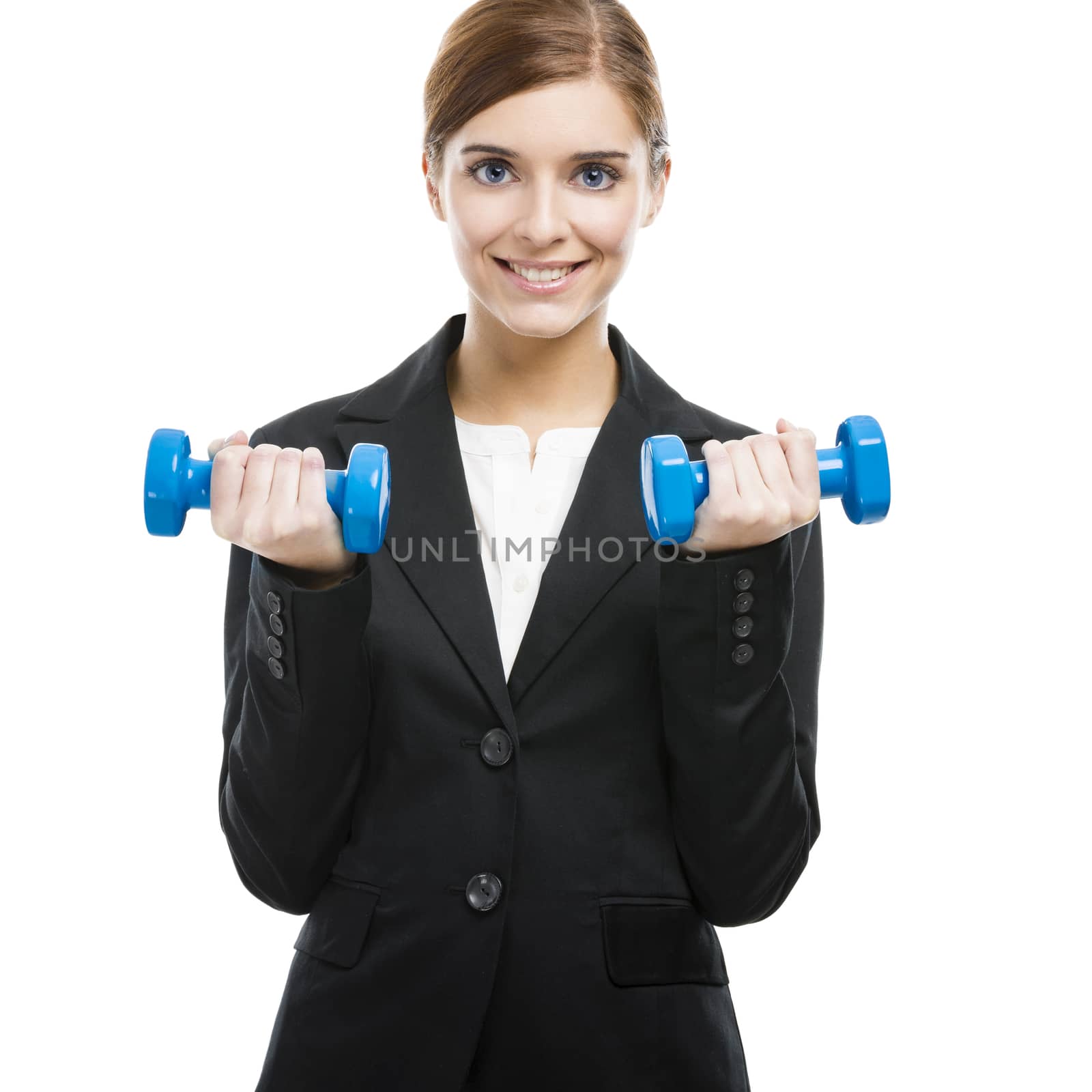 Business woman lifting weights by Iko