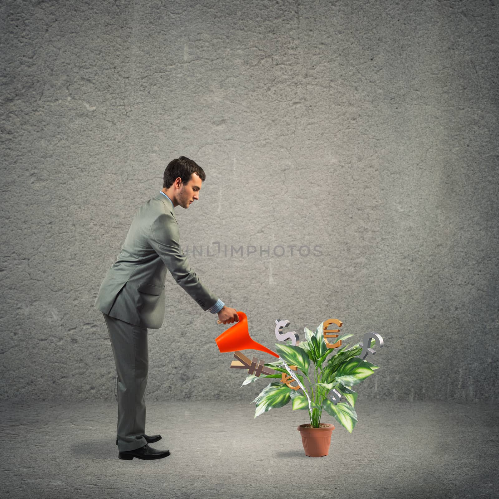 image of a businessman with a watering can