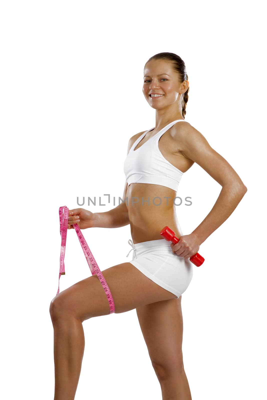 image of a young attractive woman with measuring tape and red dumbbells