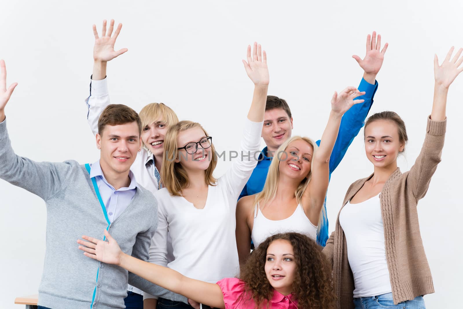 University students in the class raised their hands and having fun