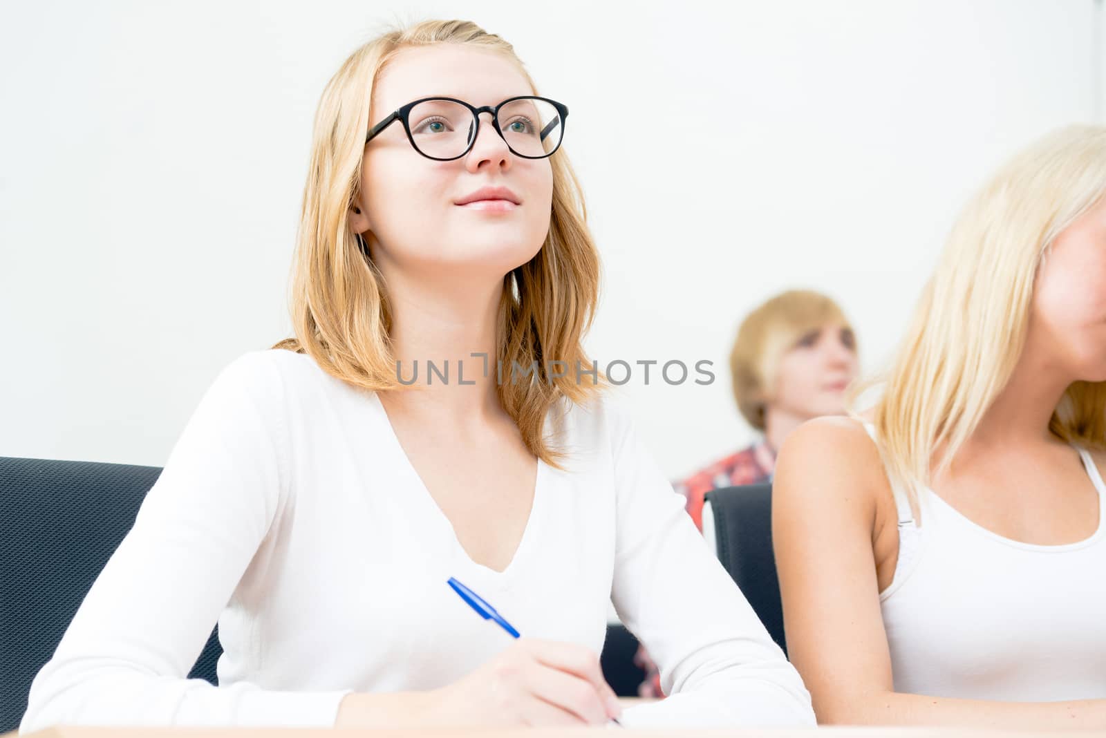 image of a young female students in the classroom, teaching at the University of