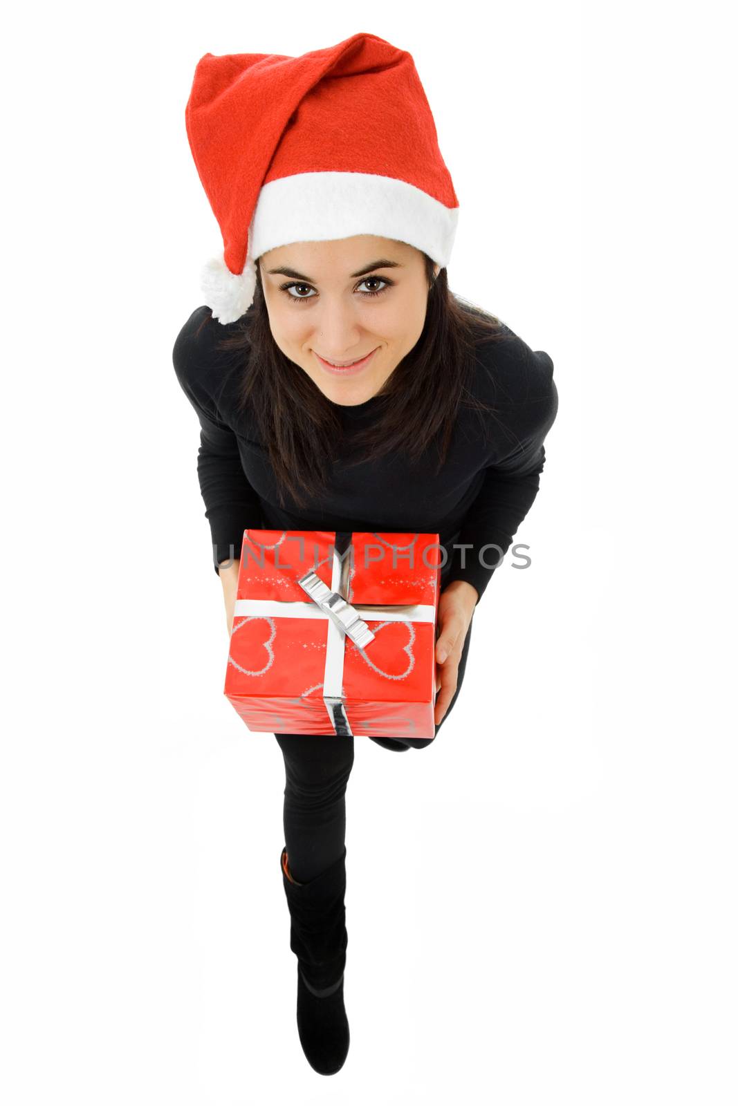 beautiful young girl holding a christmas gift, isolated