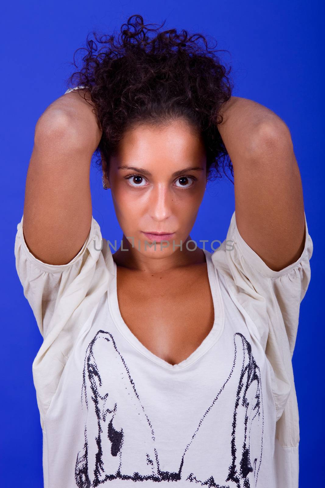 young beautiful woman, on a blue background