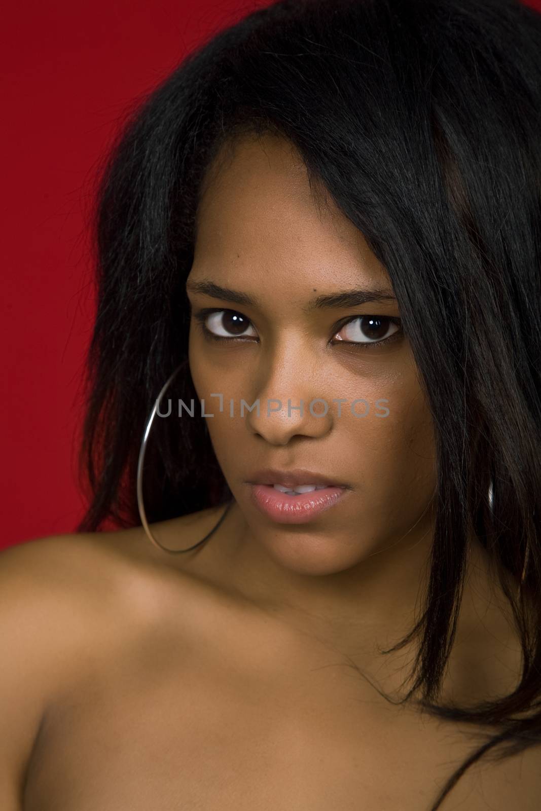 young casual woman close up portrait, studio shot