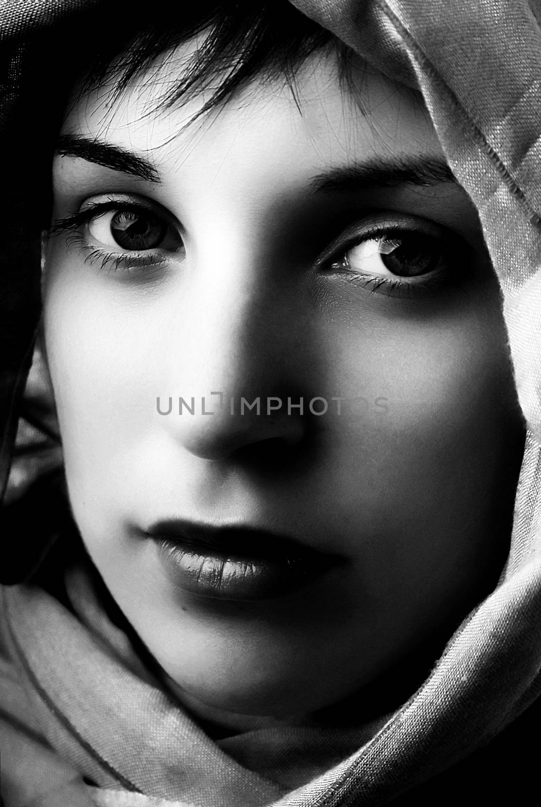 young woman close up portrait, studio picture