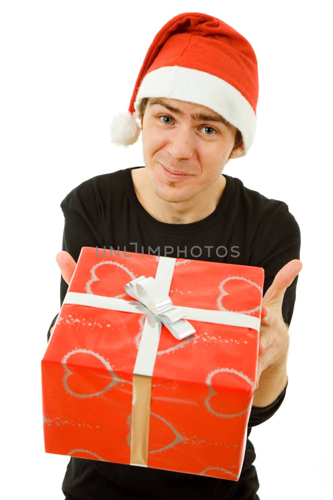 young man with santa hat holding a gift, isolated