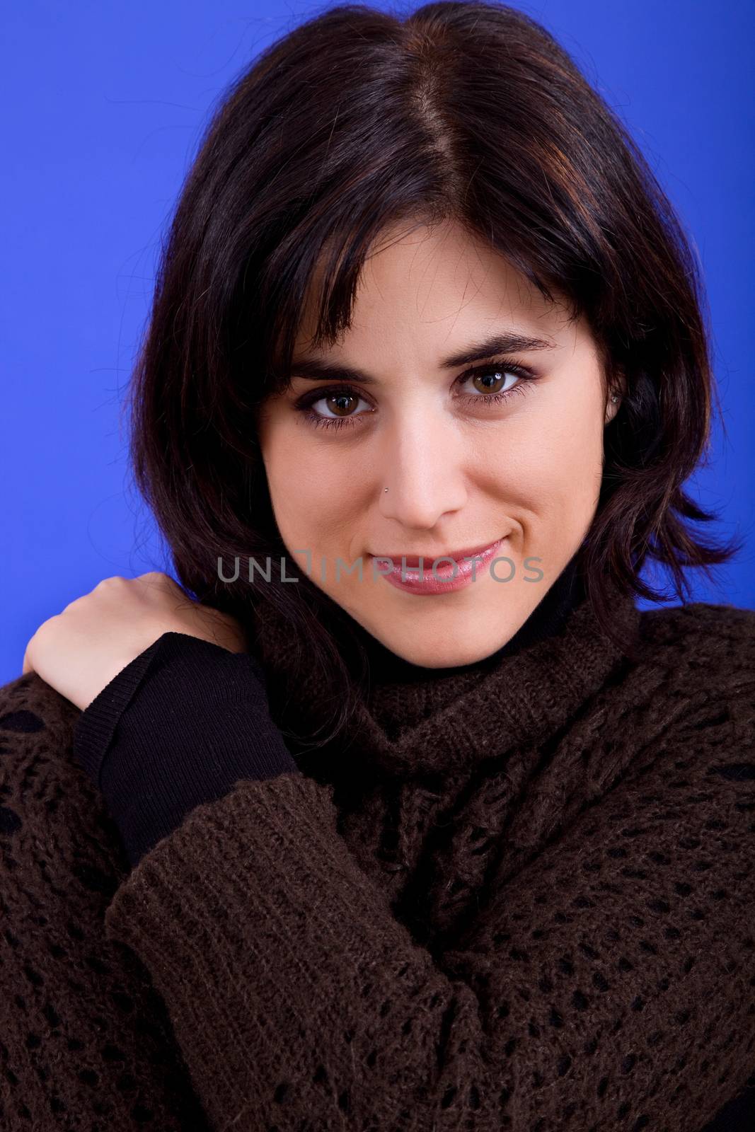 young beautiful woman, on a blue background