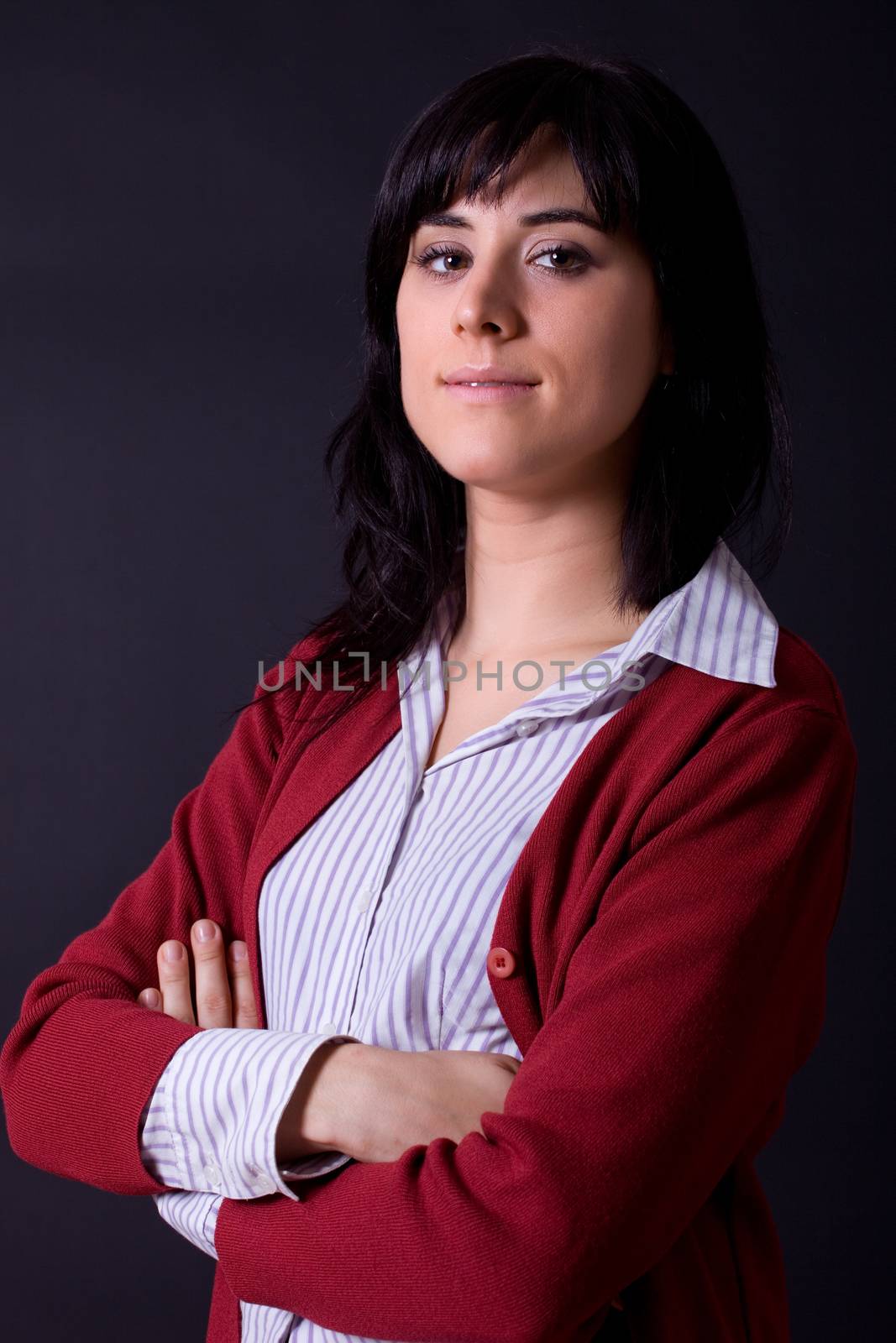 young beautiful woman, on a black background