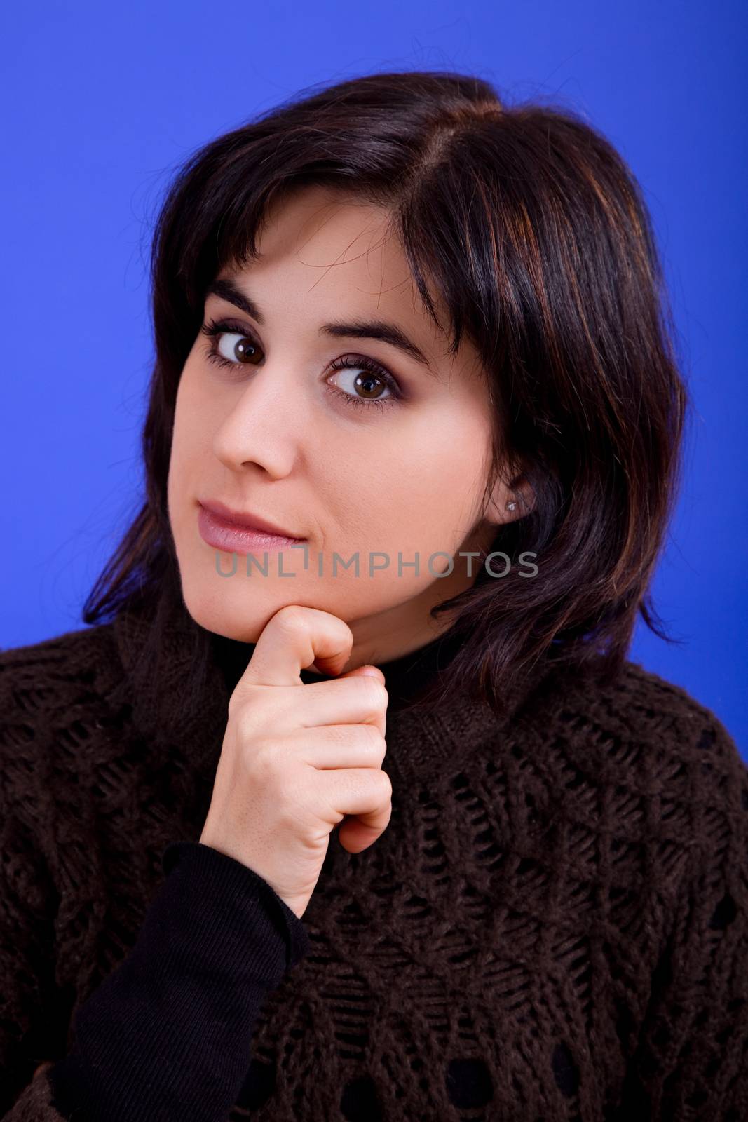 young beautiful woman, on a blue background