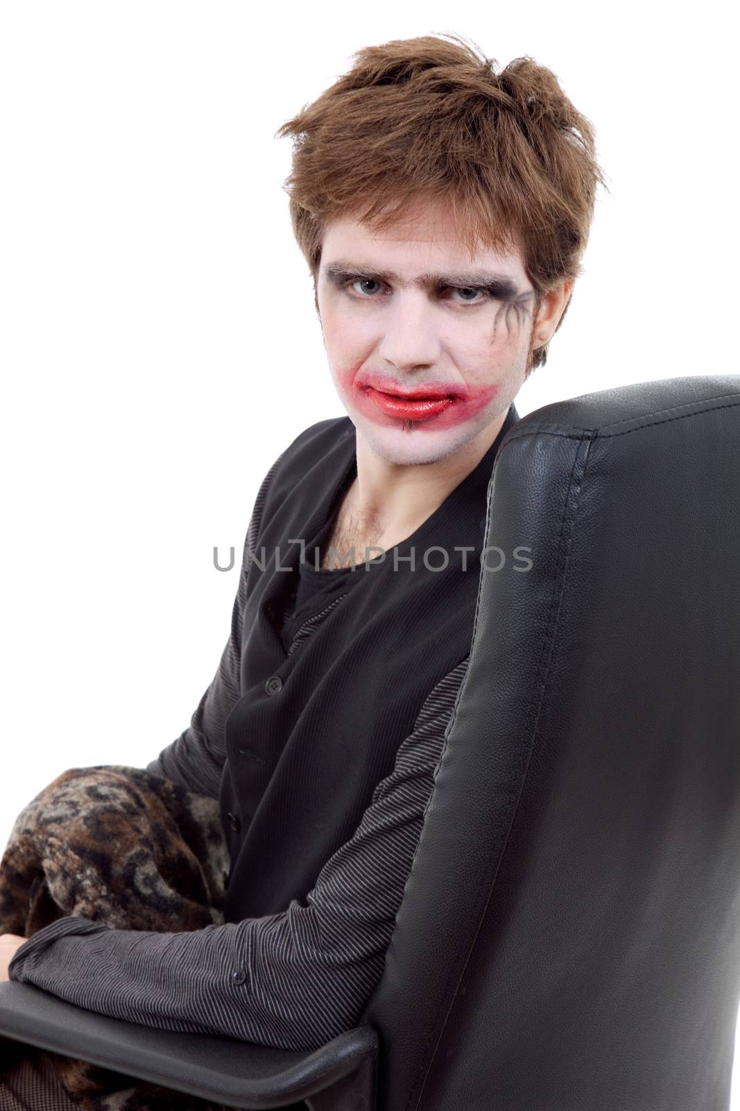 young man dressed as joker, isolated on white