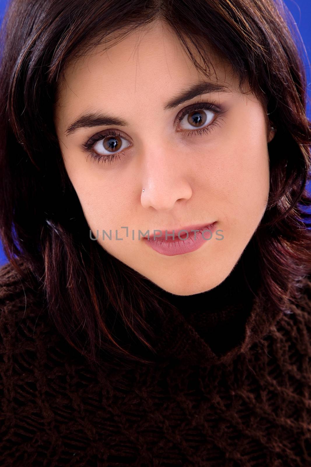 young beautiful woman, on a blue background