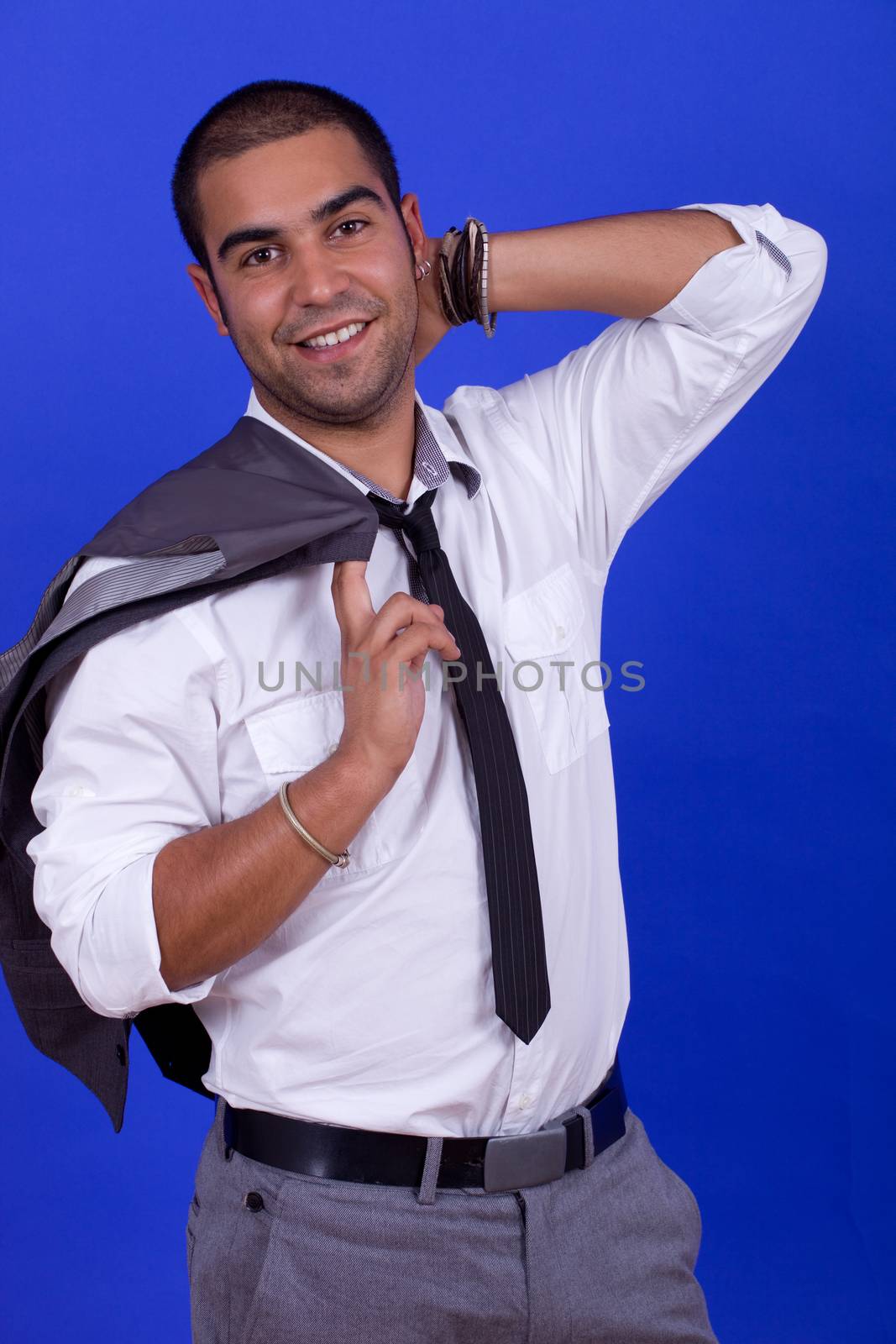 young happy businessman, on a blue background