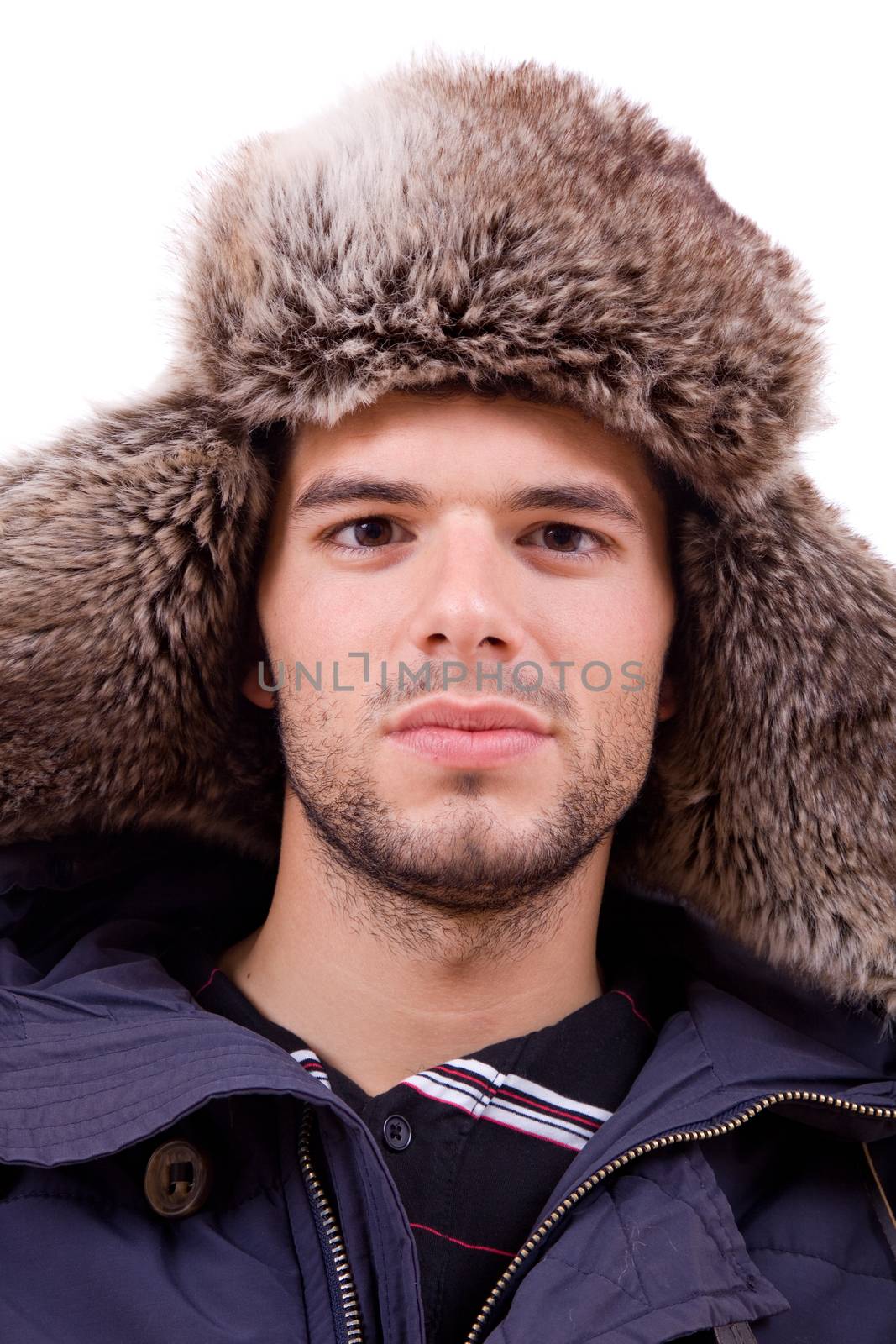 studio picture of a young man dressed for winter