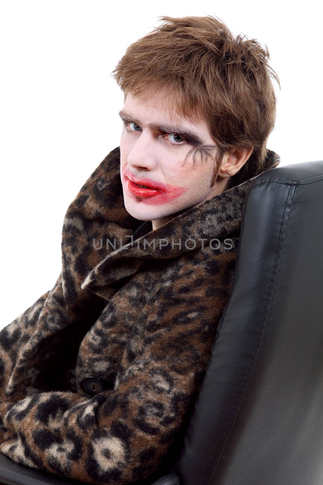 young man dressed as joker, isolated on white