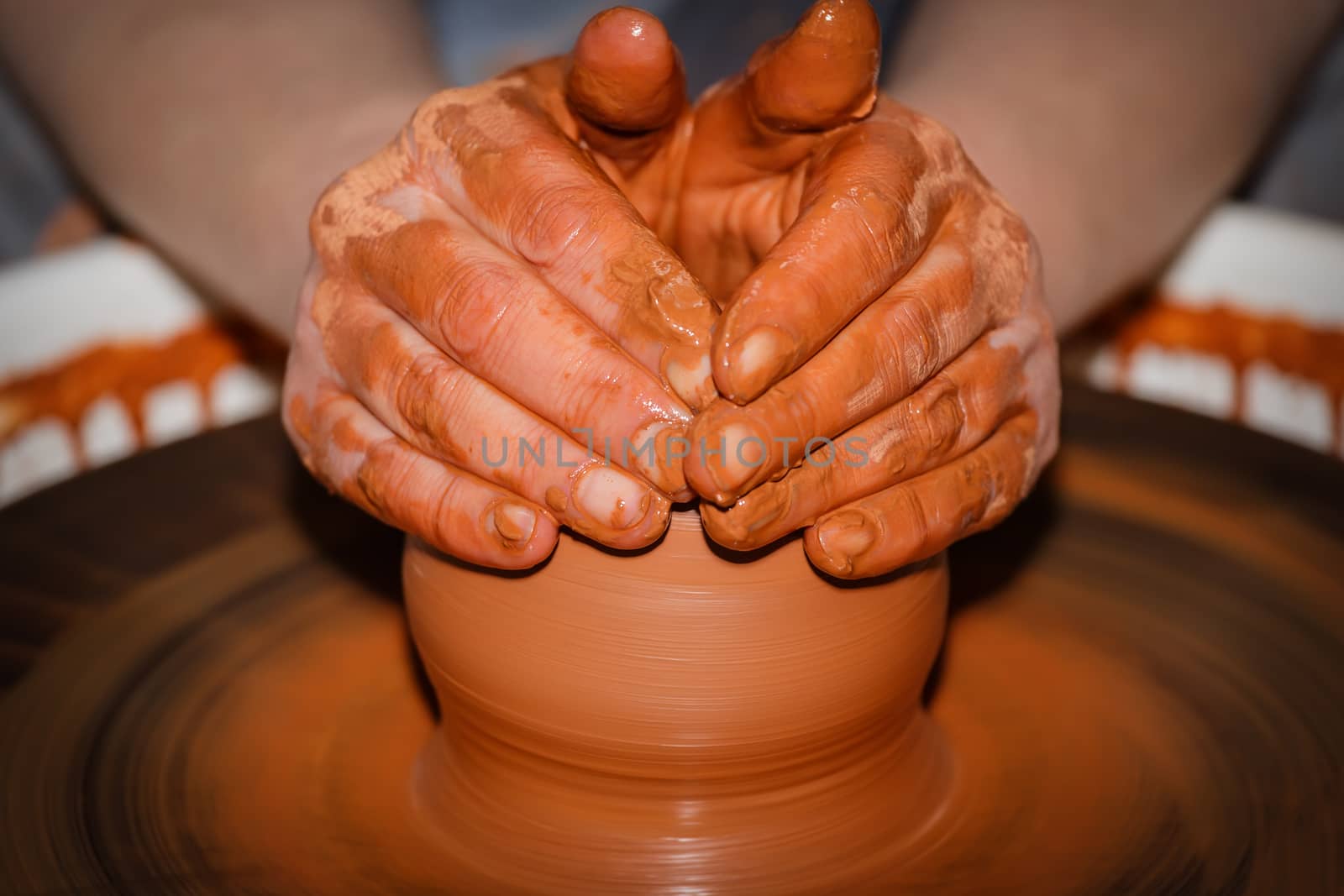 The process of creating pottery by hand