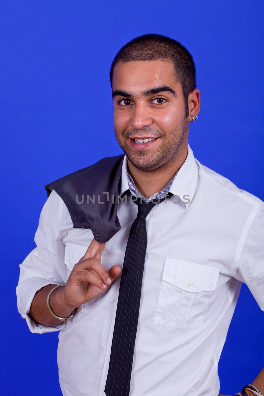 young happy businessman, on a blue background