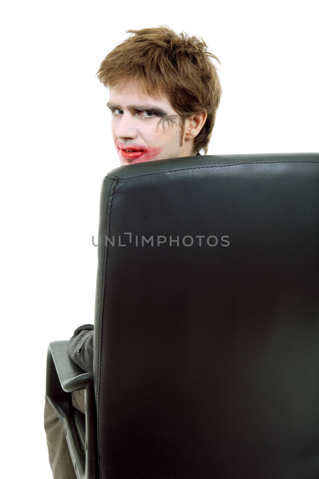 young man dressed as joker, isolated on white