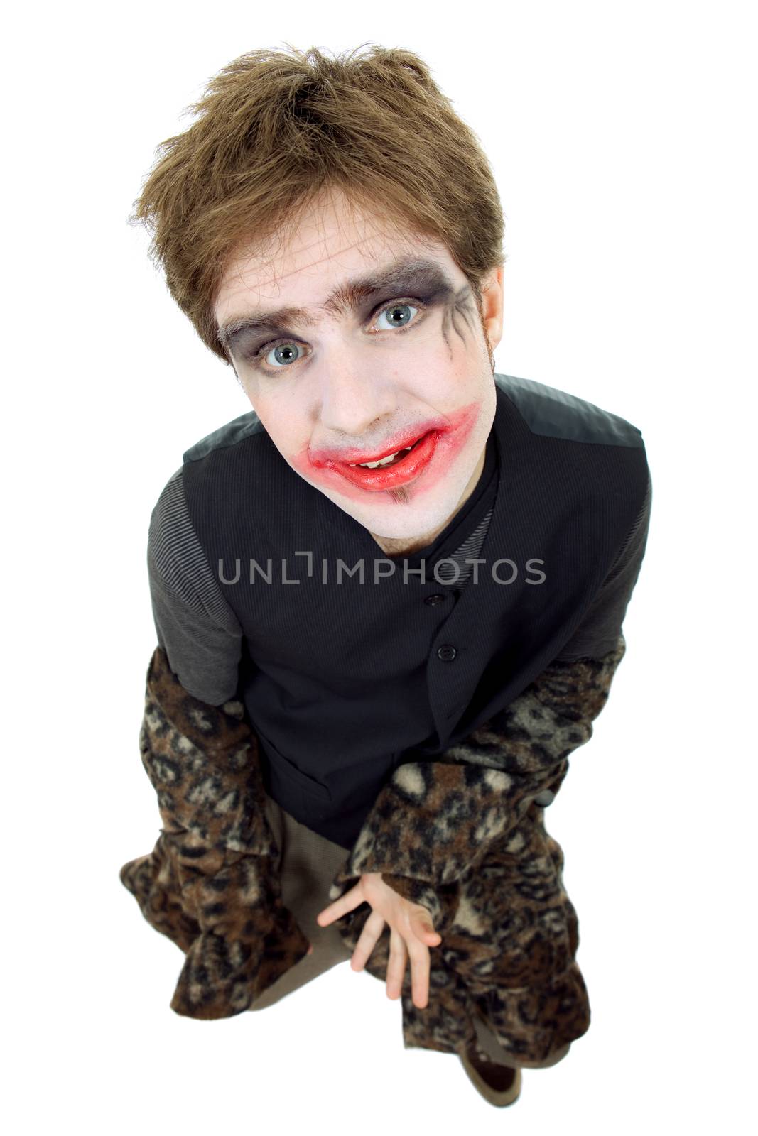 young man dressed as joker, isolated on white