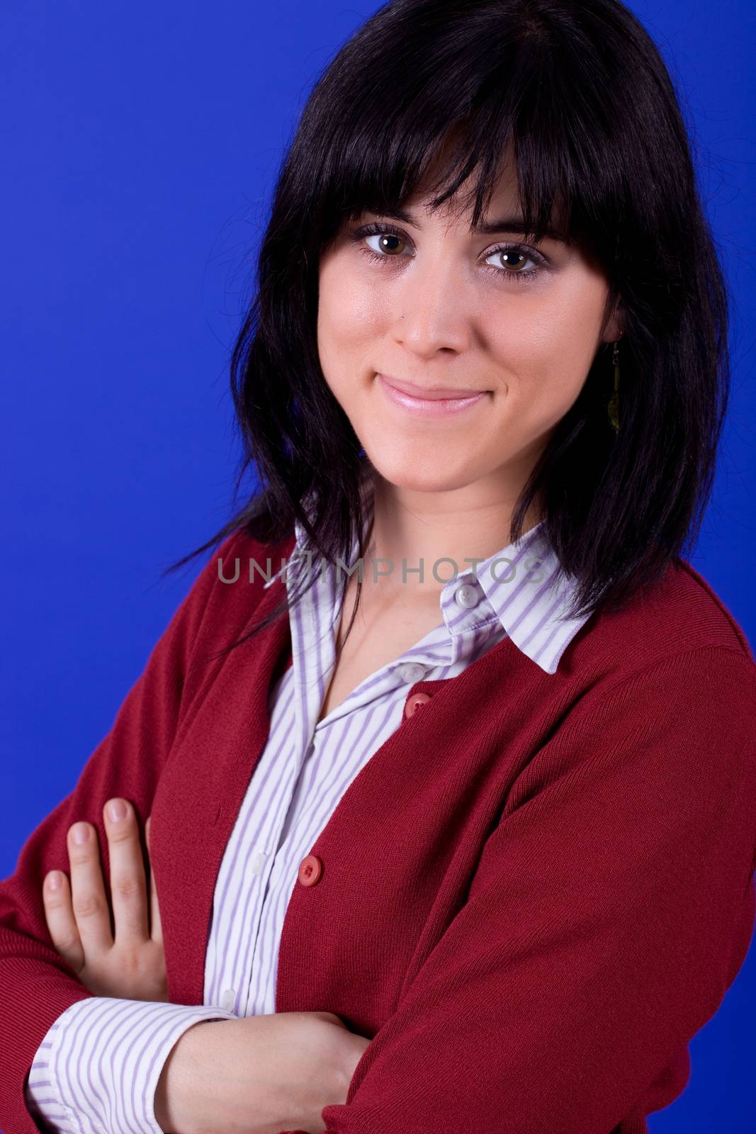 young beautiful woman, on a blue background